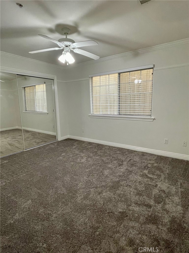 1745 Havemeyer Lane Redondo Beach, CA 90278 - Photo 18 of 20 an empty room with windows and fan