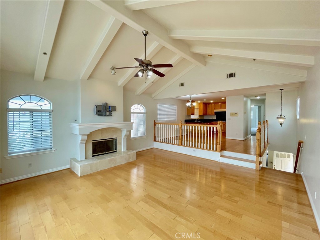 1745 Havemeyer Lane Redondo Beach, CA 90278 - Photo 3 of 20 a view of an empty room with a fireplace and a window