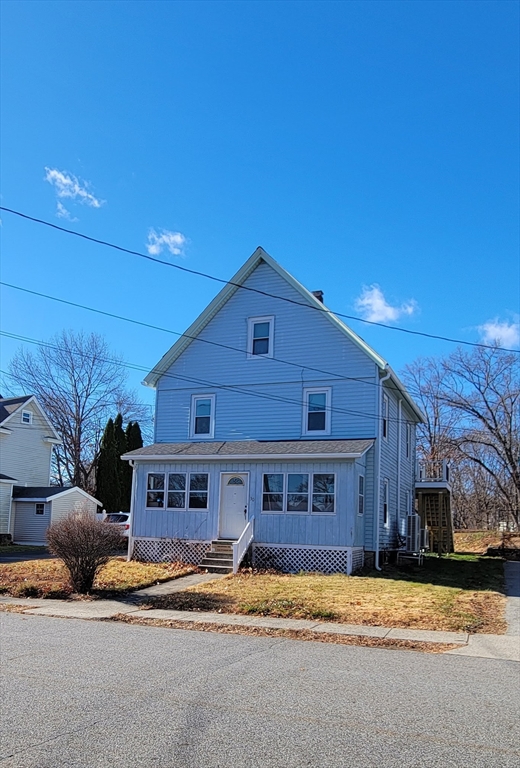 30 O'Neil Street, Unit 2 Hudson, MA 01749 - Photo 2 of 28 a view of a house with a street