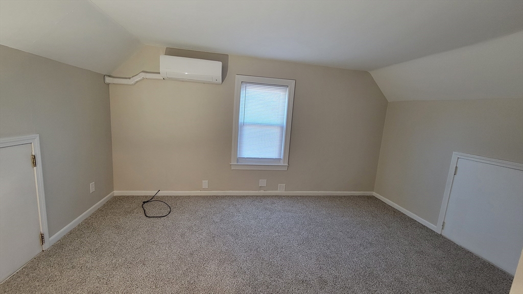 30 O'Neil Street, Unit 2 Hudson, MA 01749 - Photo 22 of 28 a view of a room with a empty space