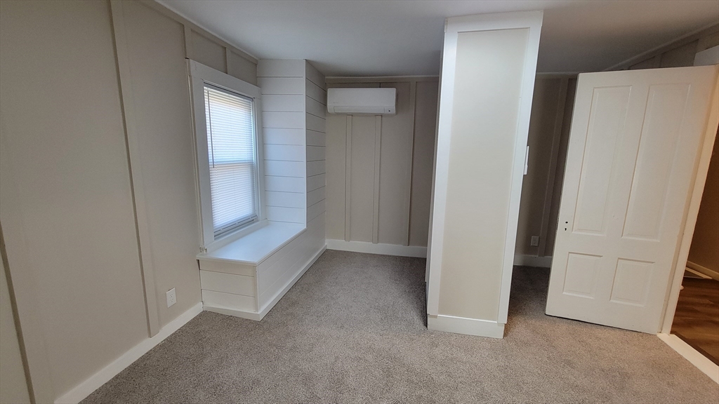30 O'Neil Street, Unit 2 Hudson, MA 01749 - Photo 25 of 28 an empty room with windows