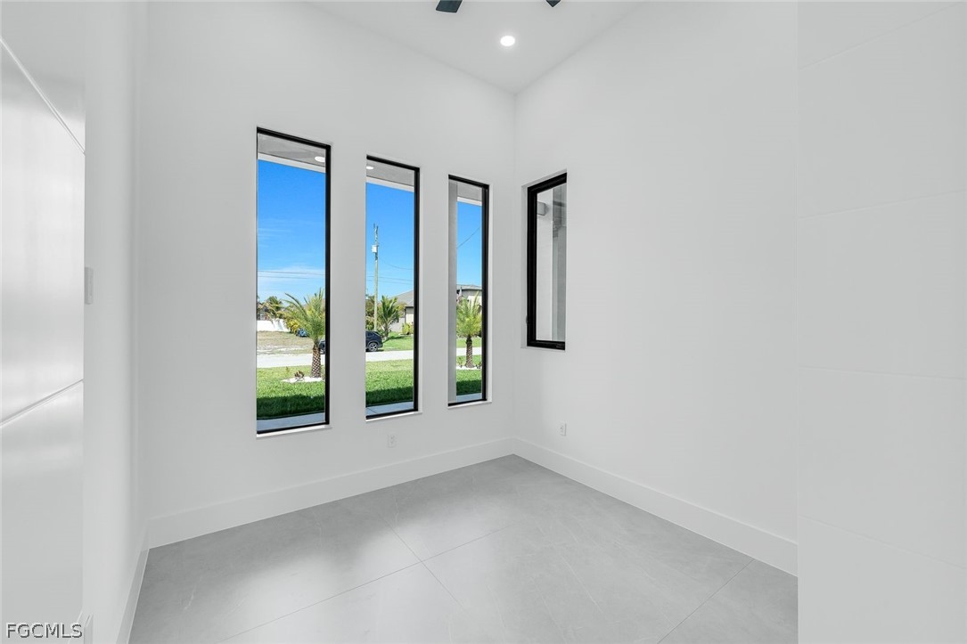 3606 Southwest 3rd Street Cape Coral, FL 33991 - Photo 33 of 47 an empty room with windows and closet
