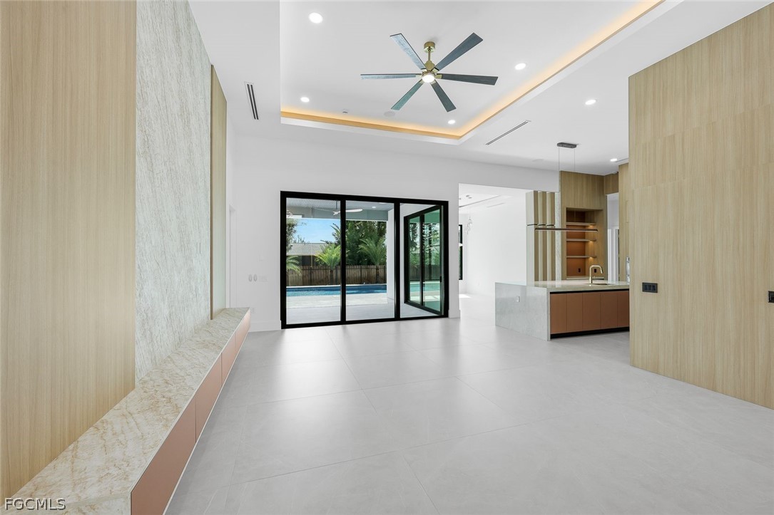 3606 Southwest 3rd Street Cape Coral, FL 33991 - Photo 8 of 47 a view of a windows and a ceiling fan in a room