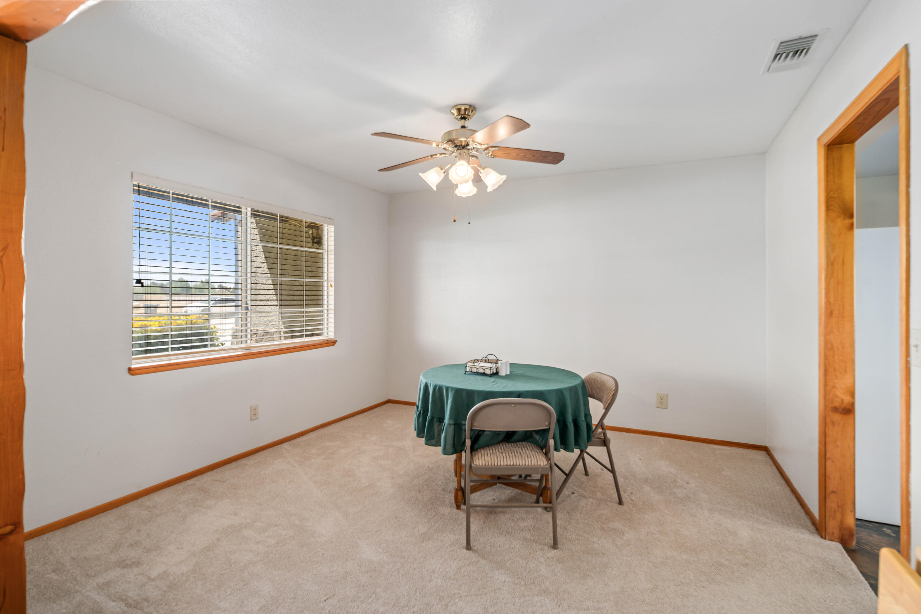 8141 Ave D-14 West Lancaster, CA 93536 - Photo 11 of 52 a workspace with furniture and a window