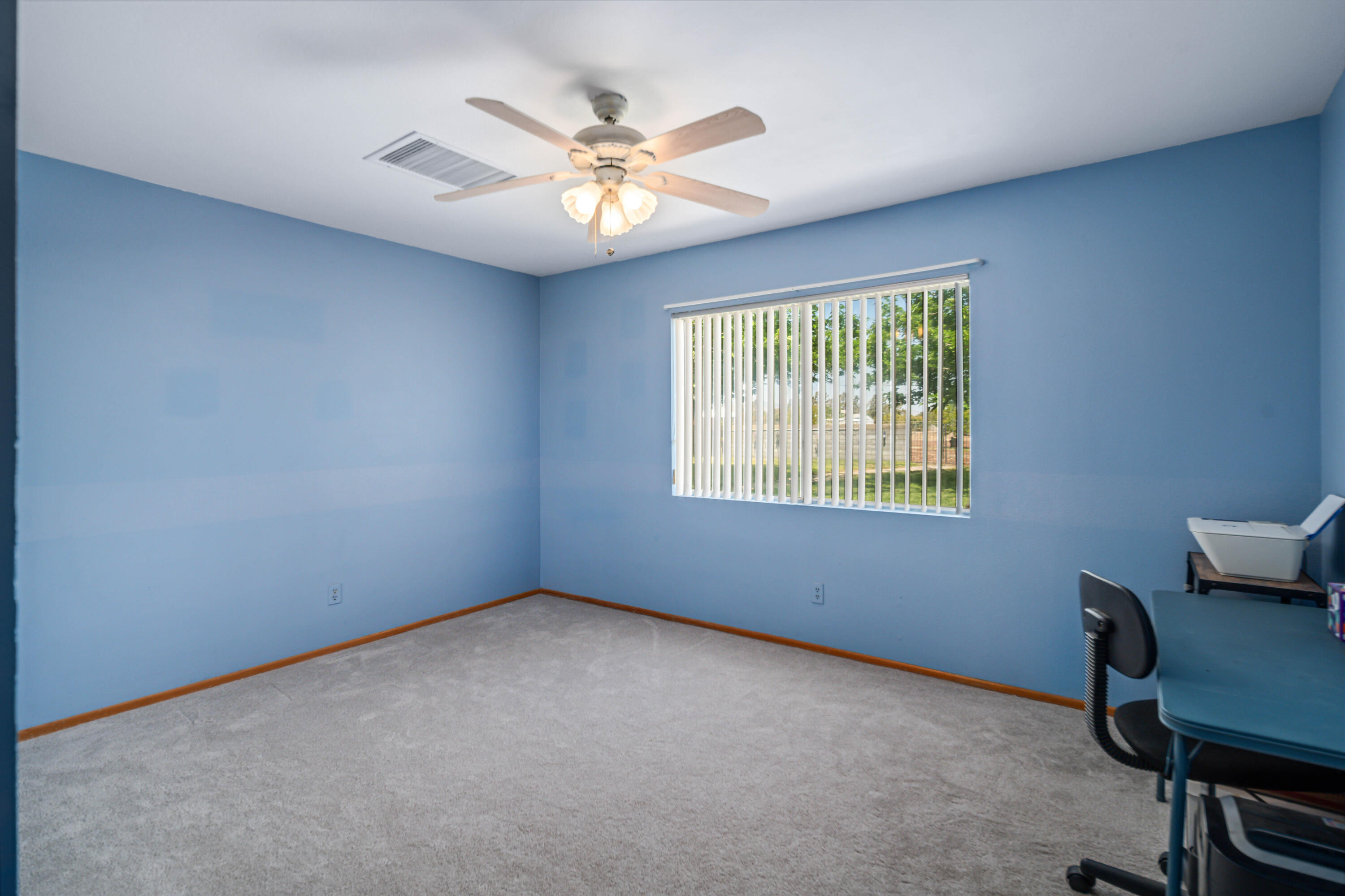 8141 Ave D-14 West Lancaster, CA 93536 - Photo 27 of 52 a view of an empty room with a window