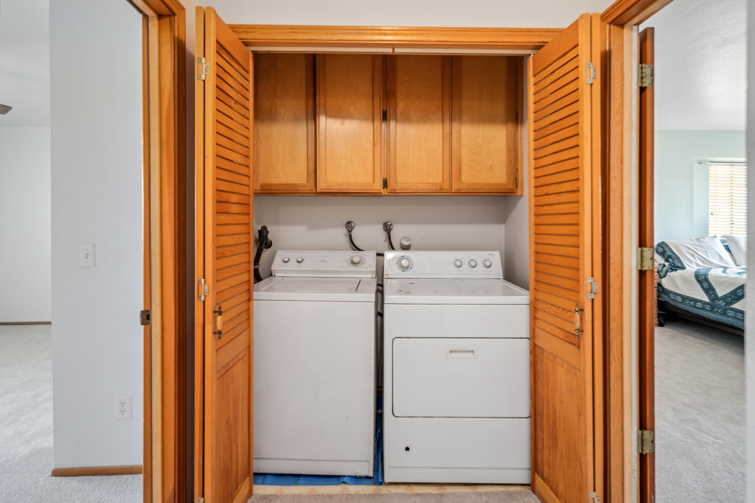 8141 Ave D-14 West Lancaster, CA 93536 - Photo 30 of 52 a utility room with a sink and cabinets