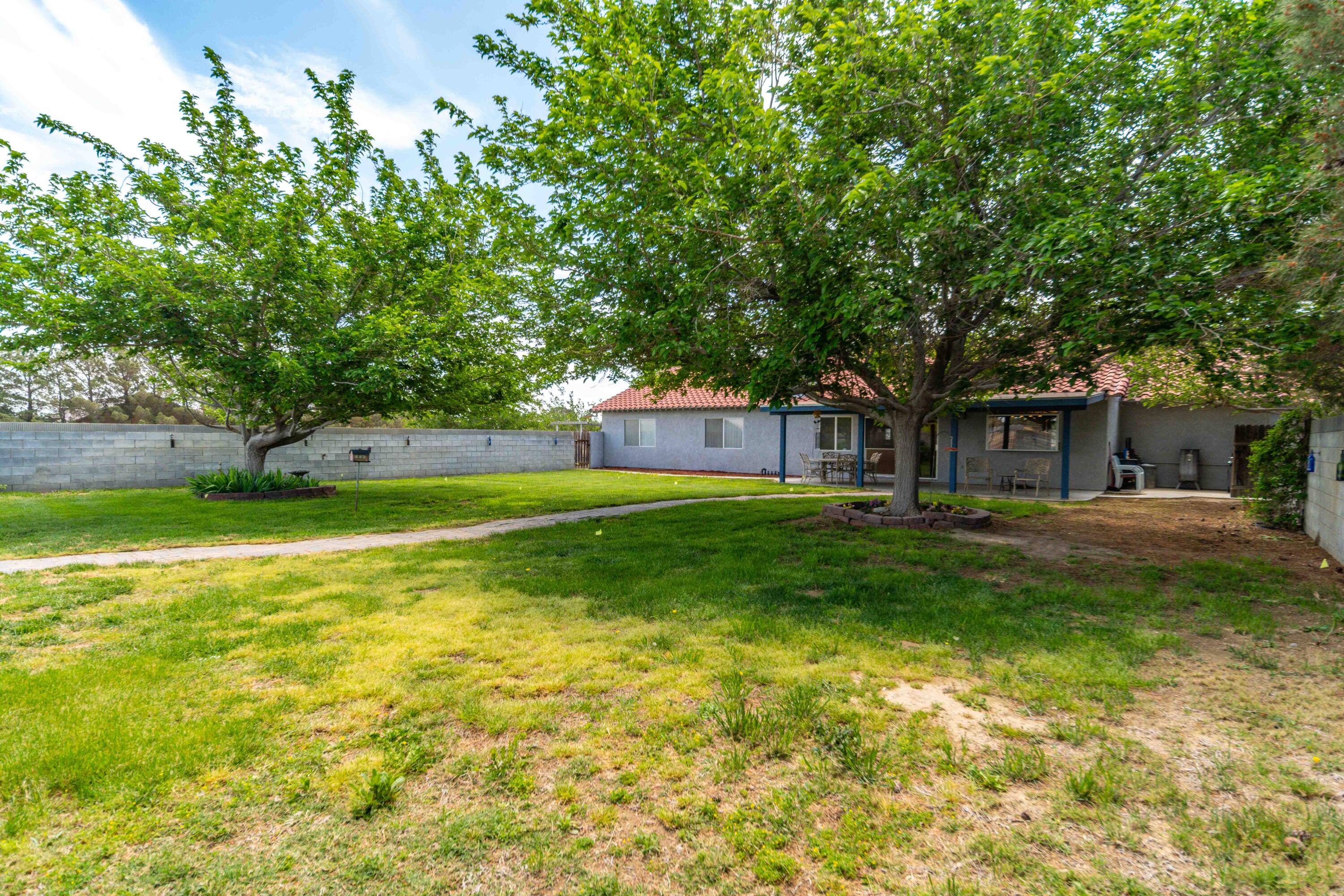 8141 Ave D-14 West Lancaster, CA 93536 - Photo 38 of 52 a view of a house with a yard porch and sitting area