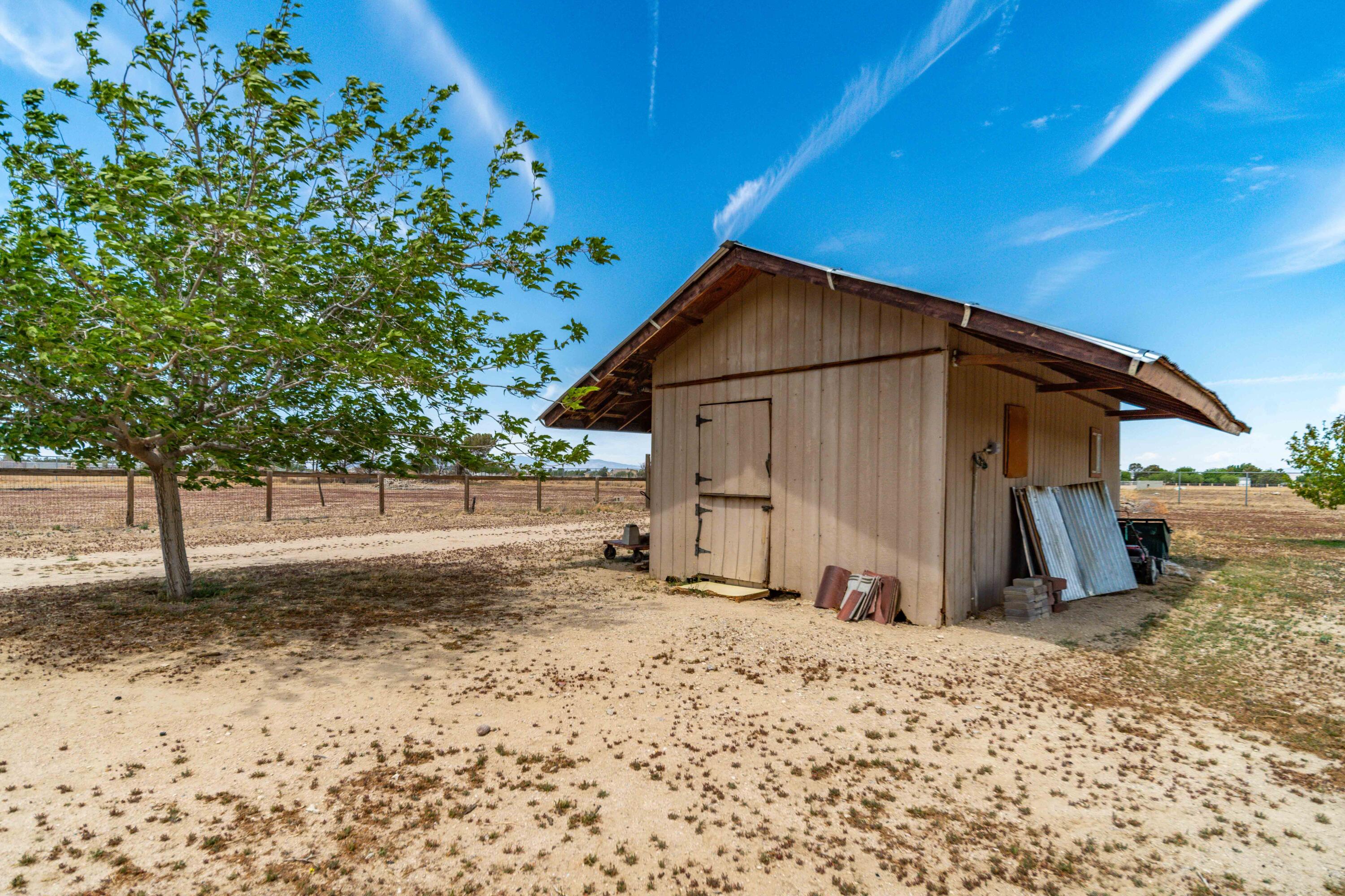 8141 Ave D-14 West Lancaster, CA 93536 - Photo 40 of 52 a view of backyard of the house