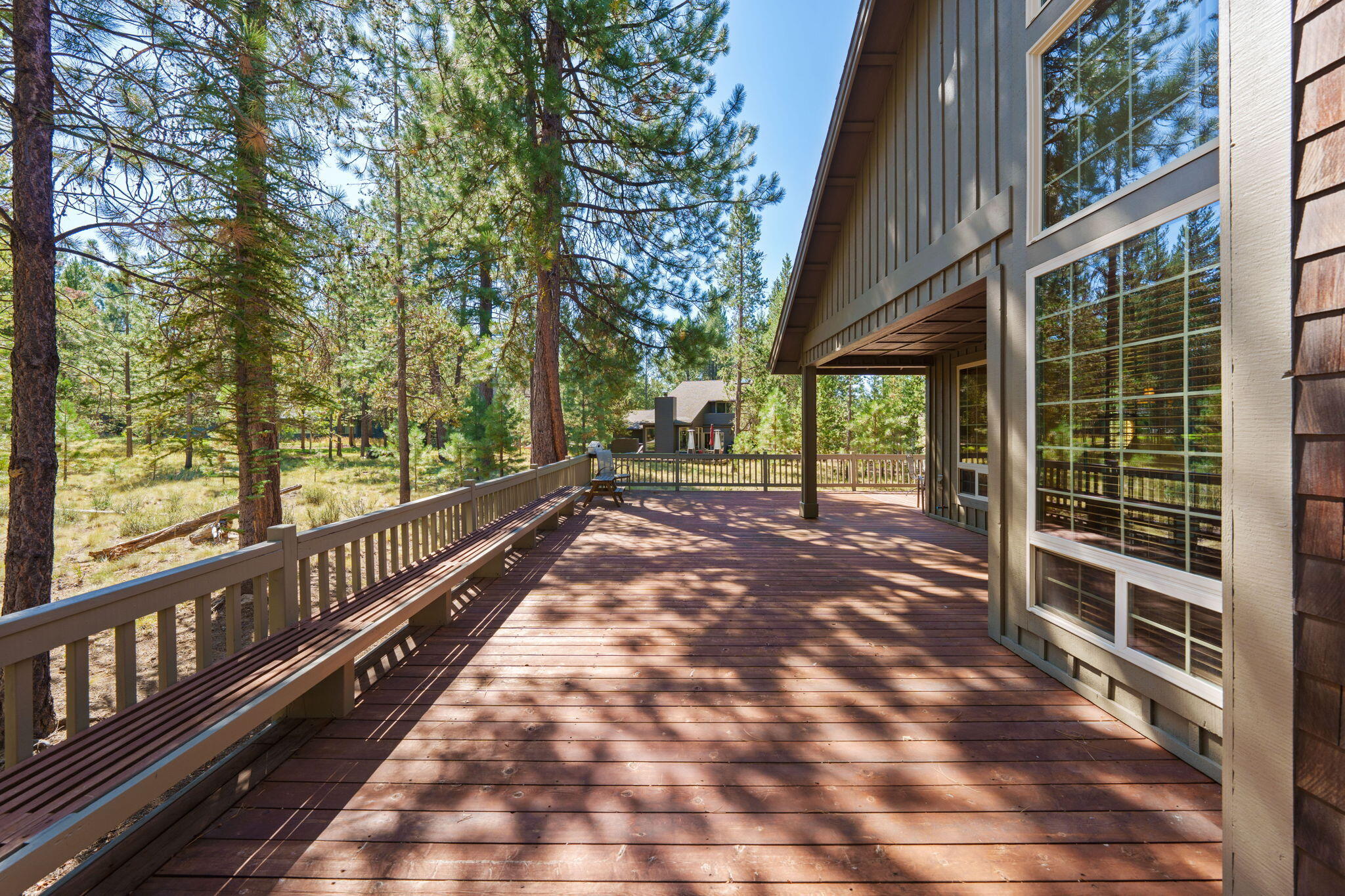 58026 Kinglet Road Sunriver, OR 97707 - Photo 31 of 39 a view of balcony with wooden floor and fence