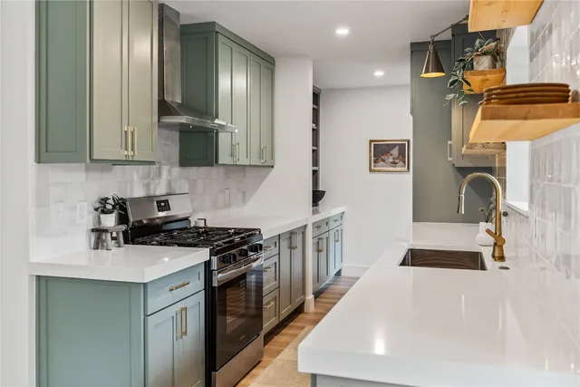 a view of a living room and hardwood floor