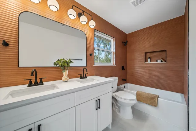 a view of a balcony with chairs