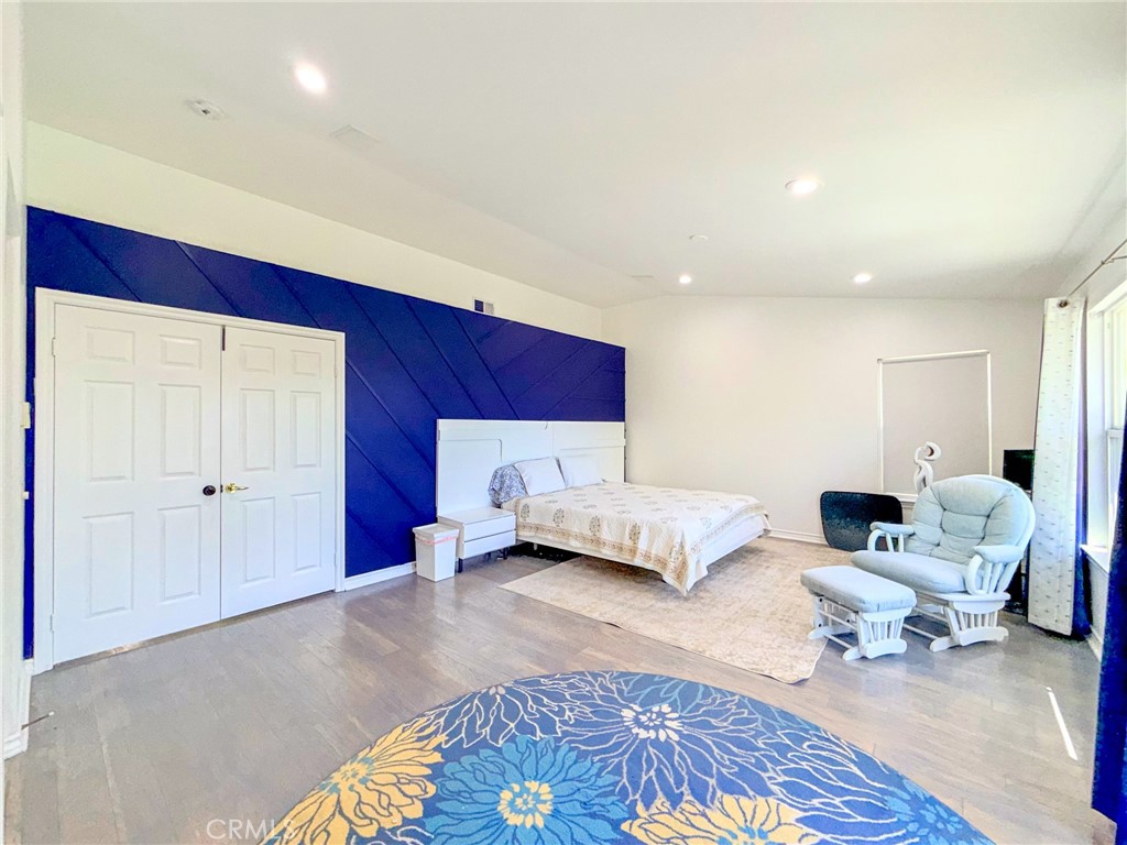 25714 Wallace Place Stevenson Ranch, CA 91381 - Photo 12 of 24 a living room with furniture and a couch