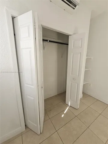 a view of balcony with furniture