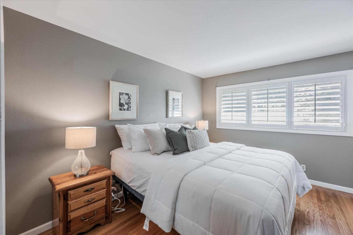 145 Lassen Drive San Bruno, CA 94066 - Photo 12 of 29 a bedroom with a bed and a night stand