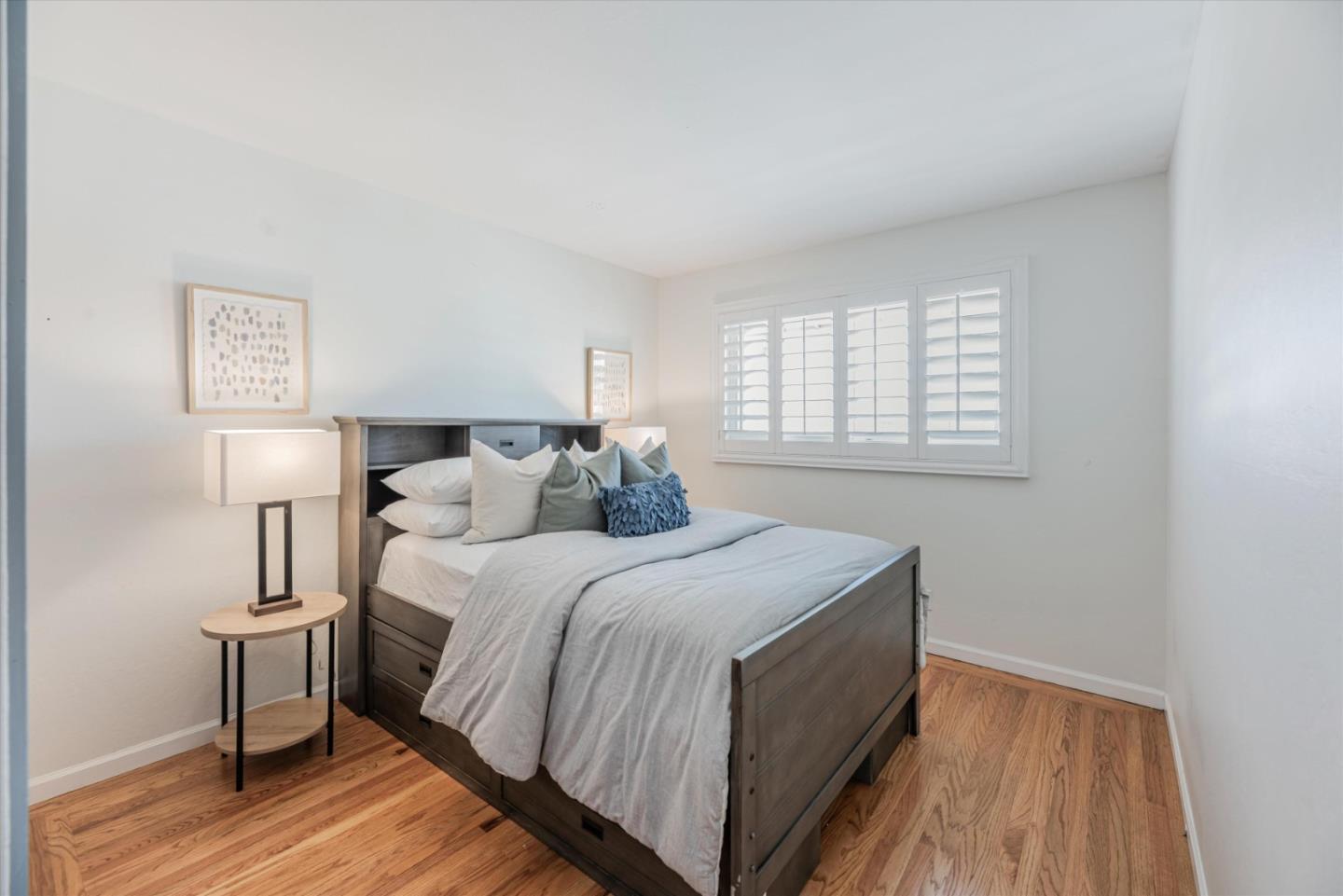 145 Lassen Drive San Bruno, CA 94066 - Photo 14 of 29 a bedroom with a bed and a night stand