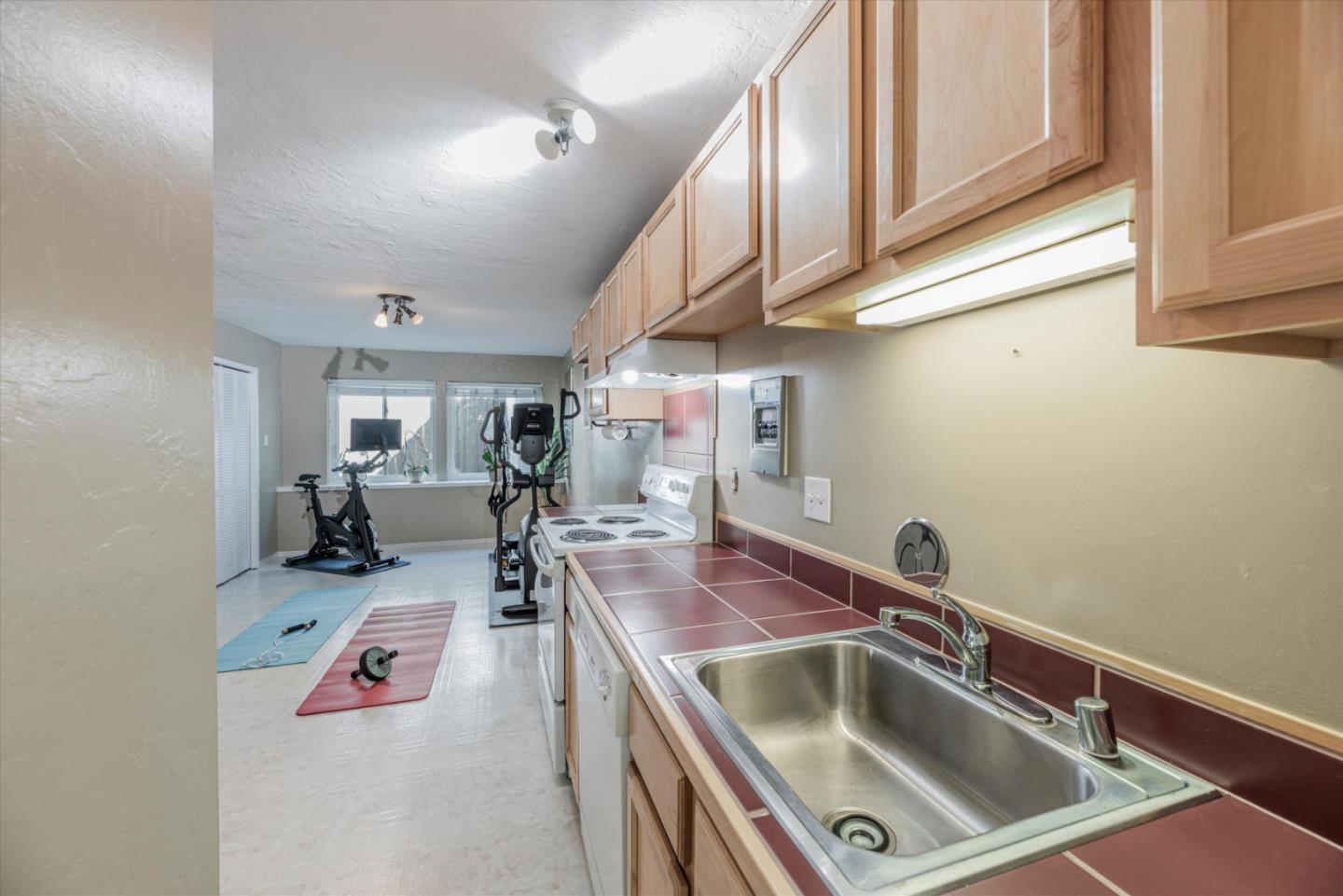 145 Lassen Drive San Bruno, CA 94066 - Photo 15 of 29 a kitchen that has a sink and cabinets