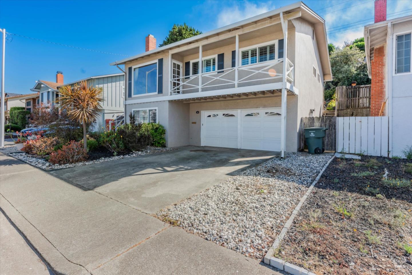 145 Lassen Drive San Bruno, CA 94066 - Photo 2 of 29 a front view of a house with a yard