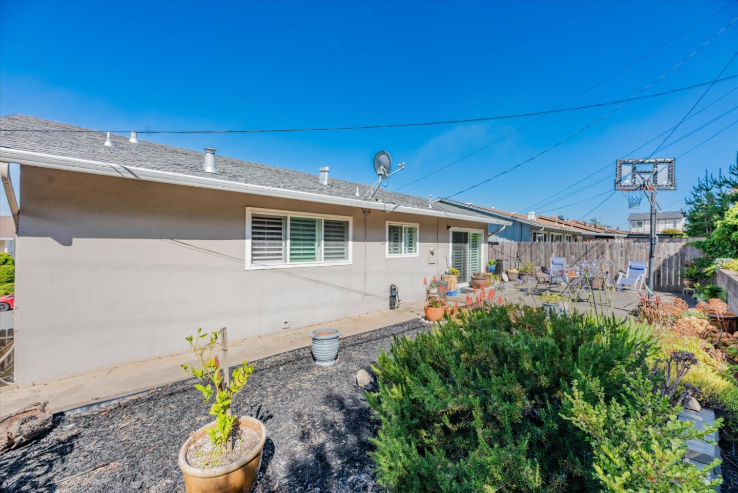 145 Lassen Drive San Bruno, CA 94066 - Photo 27 of 29 a front view of a house with a yard
