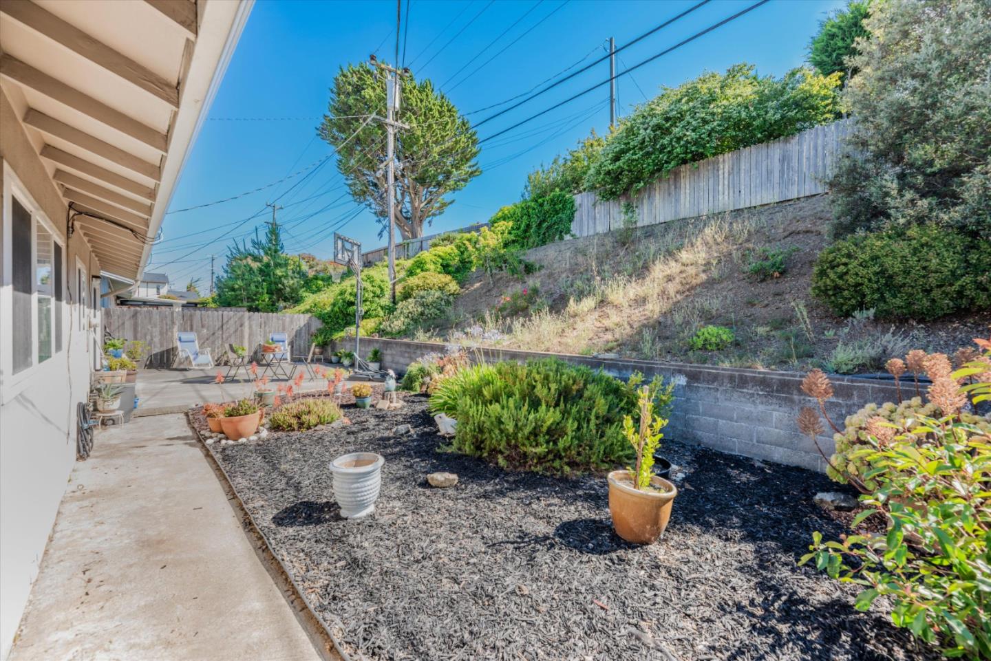 145 Lassen Drive San Bruno, CA 94066 - Photo 29 of 29 a garden view with a seating space