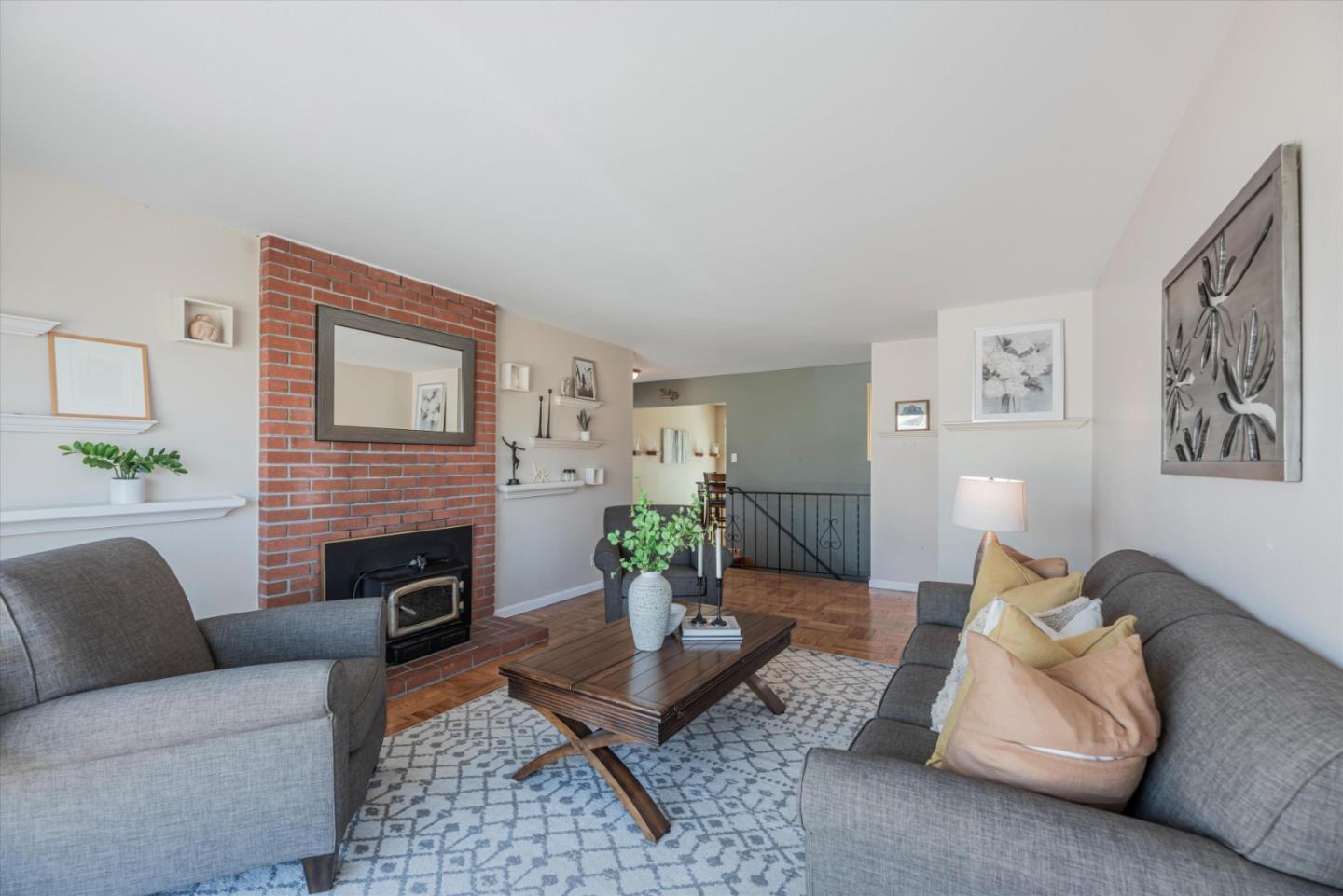 145 Lassen Drive San Bruno, CA 94066 - Photo 4 of 29 a living room with furniture fireplace and a table