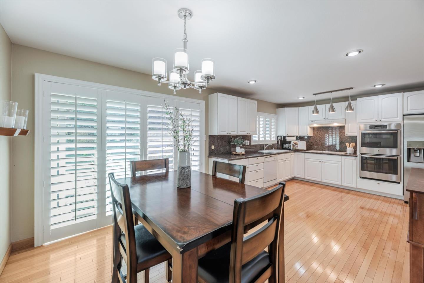 145 Lassen Drive San Bruno, CA 94066 - Photo 6 of 29 a view of a dining room and livingroom view kitchen