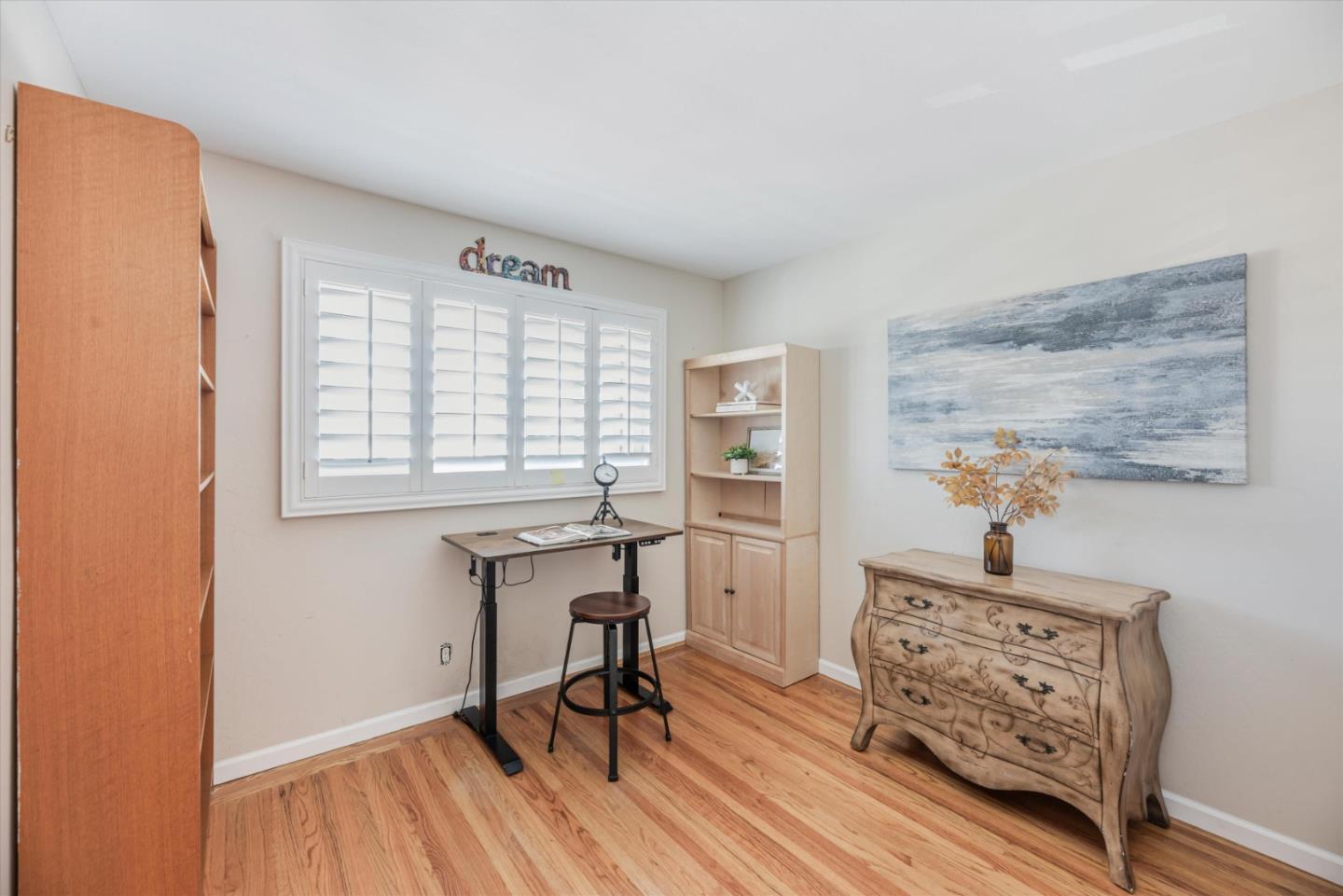 145 Lassen Drive San Bruno, CA 94066 - Photo 9 of 29 a workspace with wooden floor