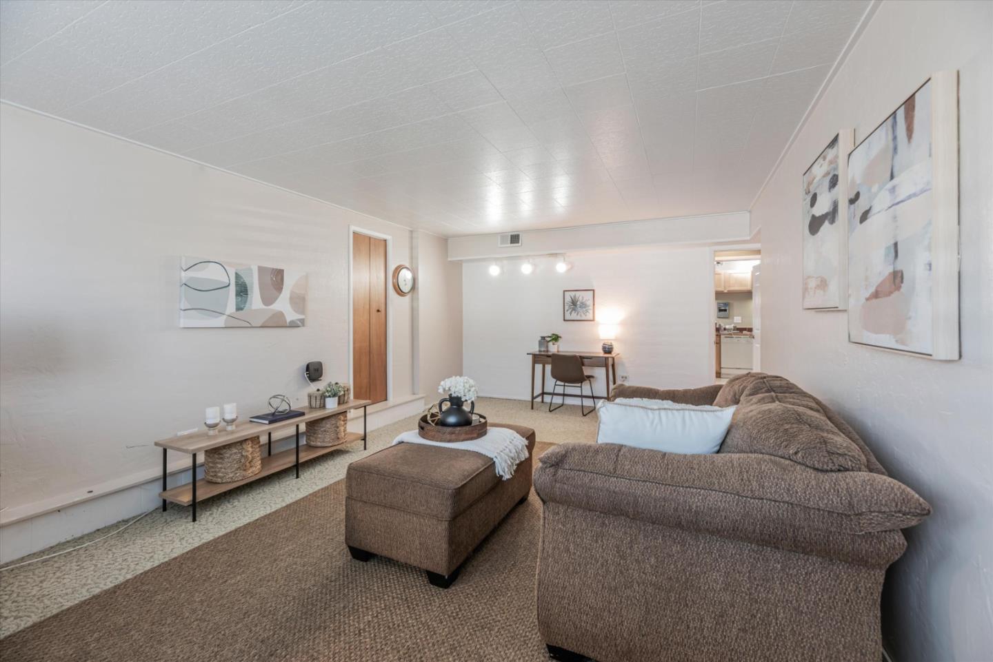 145 Lassen Drive San Bruno, CA 94066 - Photo 10 of 29 a living room with furniture and a couch