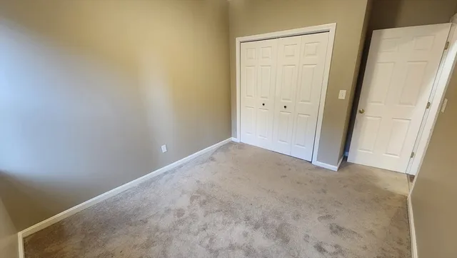 an empty room with a door