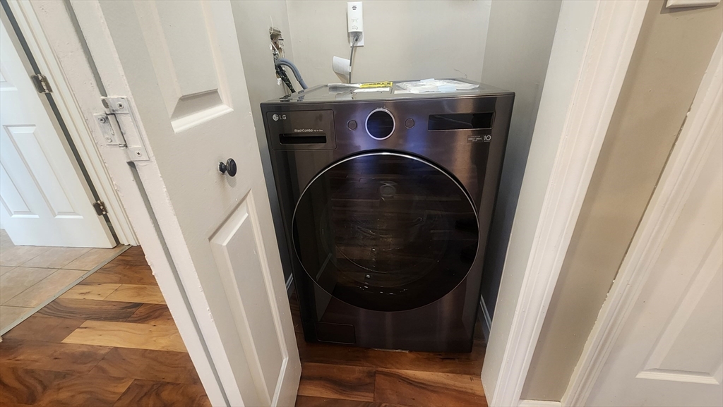 19 Washington Street, Unit 5 Haverhill, MA 01832 - Photo 14 of 17 a utility room with dryer and washer