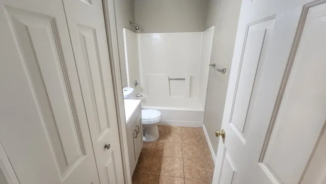 a bathroom with a sink and toilet
