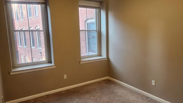 an empty room with windows