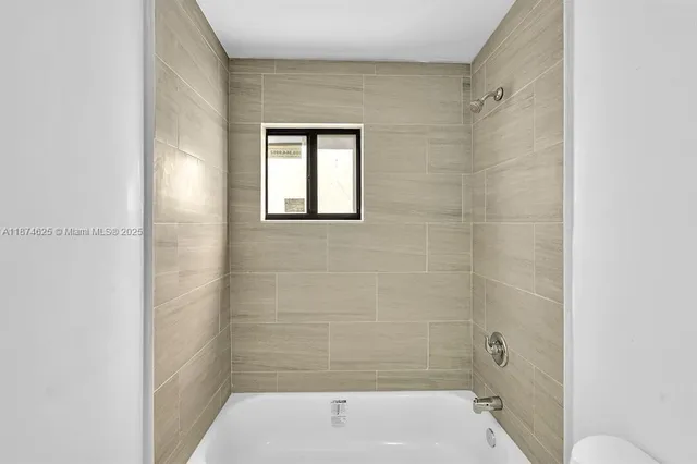 a bathroom with a bathtub