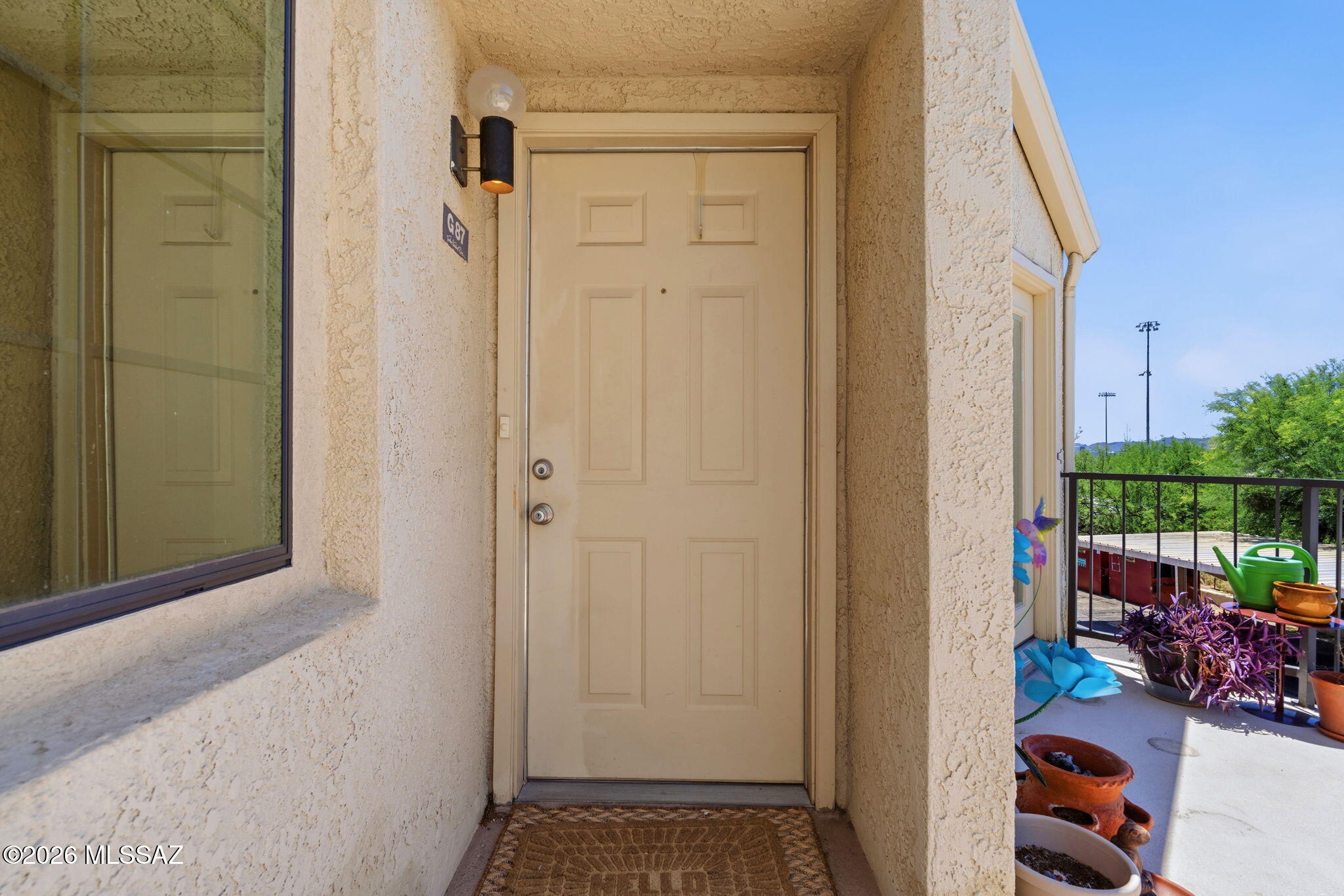 1200 East River Road, Unit G87 Tucson, AZ 85718 - Photo 3 of 30 a view of an entryway