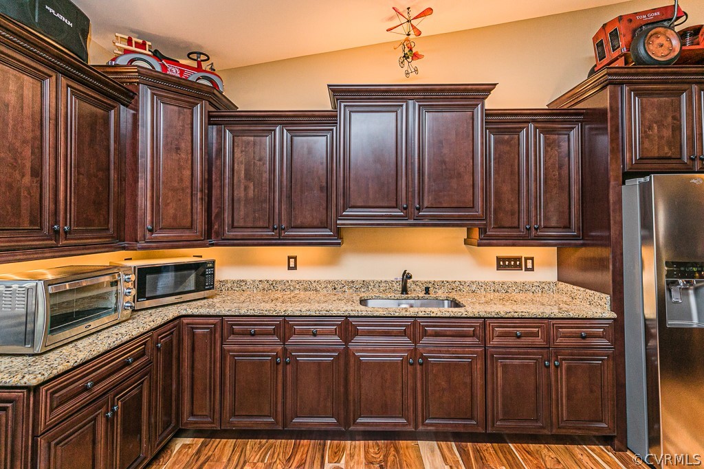 1982 Mountain Road Glen Allen, VA 23060 - Photo 16 of 49 a kitchen with granite countertop a sink and a stove