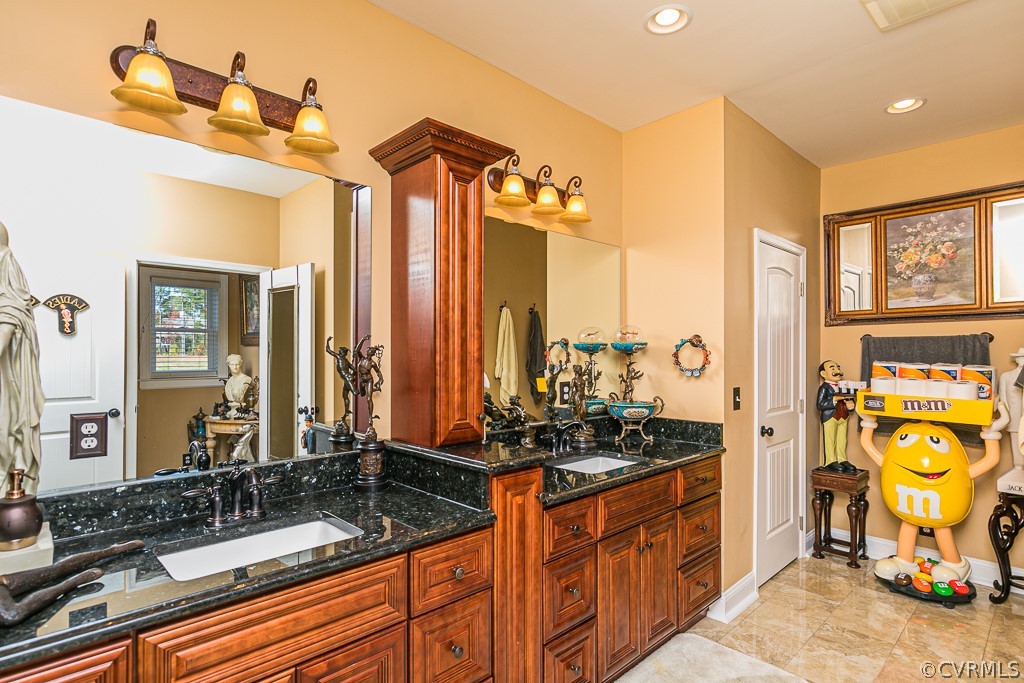 1982 Mountain Road Glen Allen, VA 23060 - Photo 30 of 49 a bathroom with a sink and a mirror