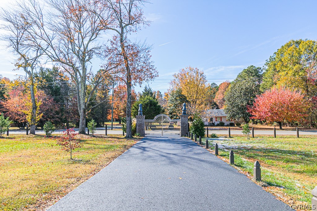 1982 Mountain Road Glen Allen, VA 23060 - Photo 47 of 49 a view of a swimming pool with a bench and trees