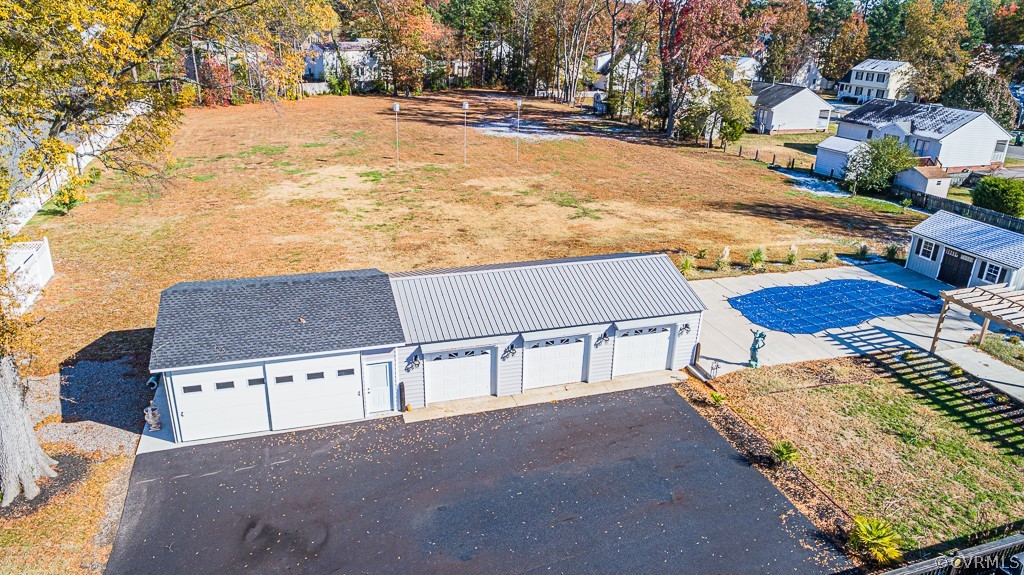 1982 Mountain Road Glen Allen, VA 23060 - Photo 7 of 49 a view of residential houses with yard and road