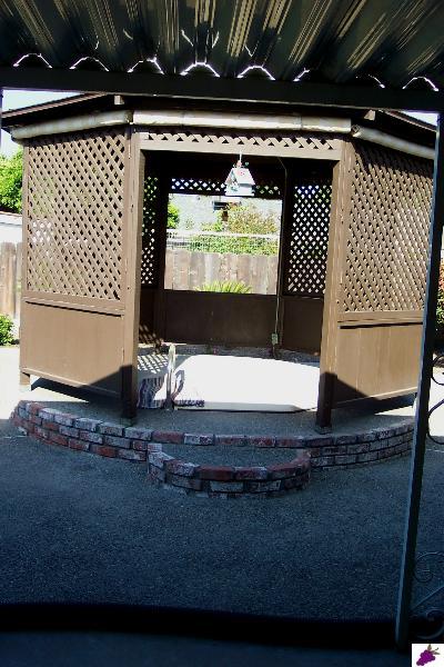 1211 North Hope Avenue Reedley, CA 93654 - Photo 8 of 11 Gorgeous in-ground spa and gazebo.