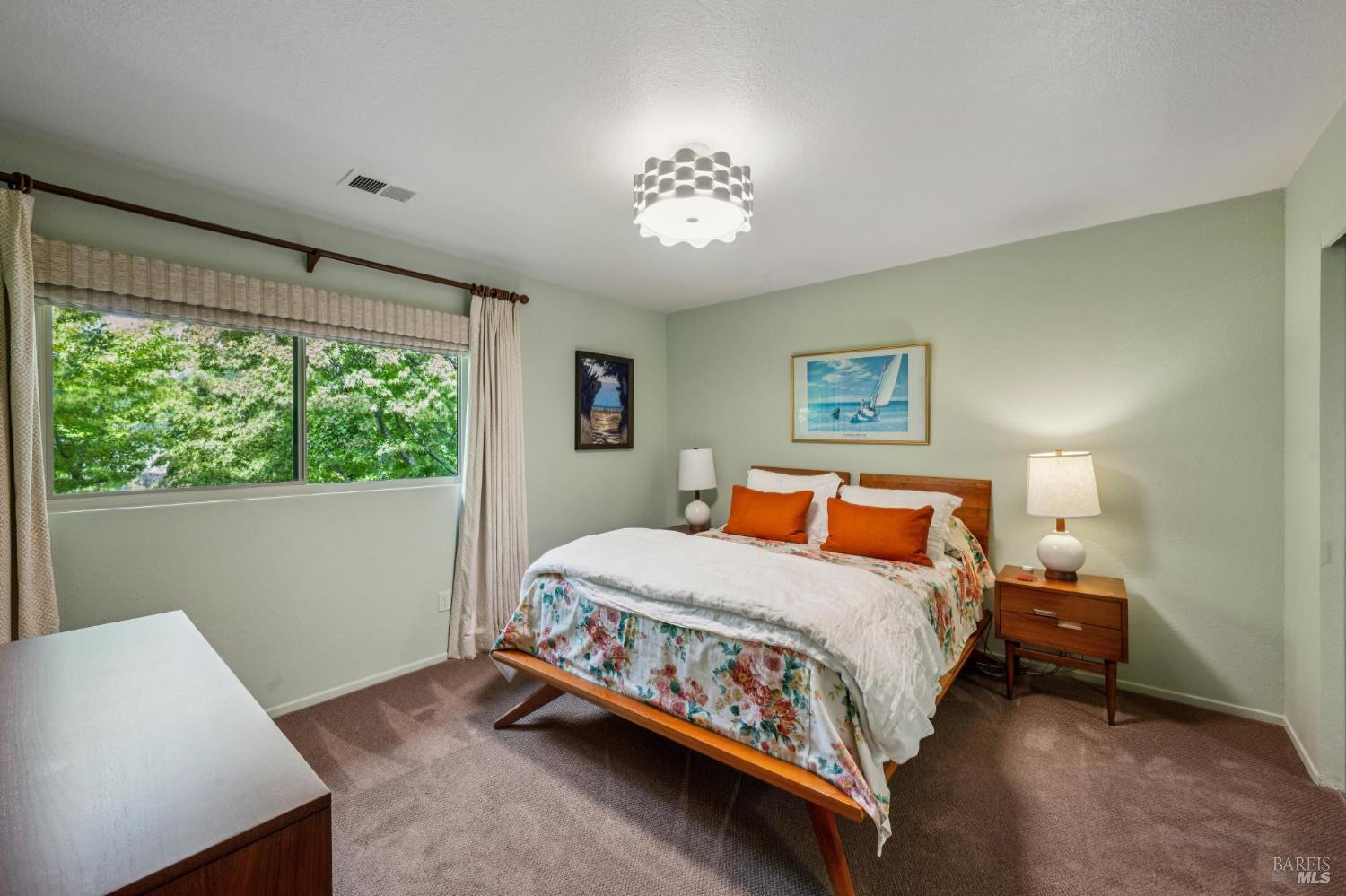 19167 Robinson Road, Unit Y Sonoma, CA 95476 - Photo 19 of 32 a bedroom with a bed and a window