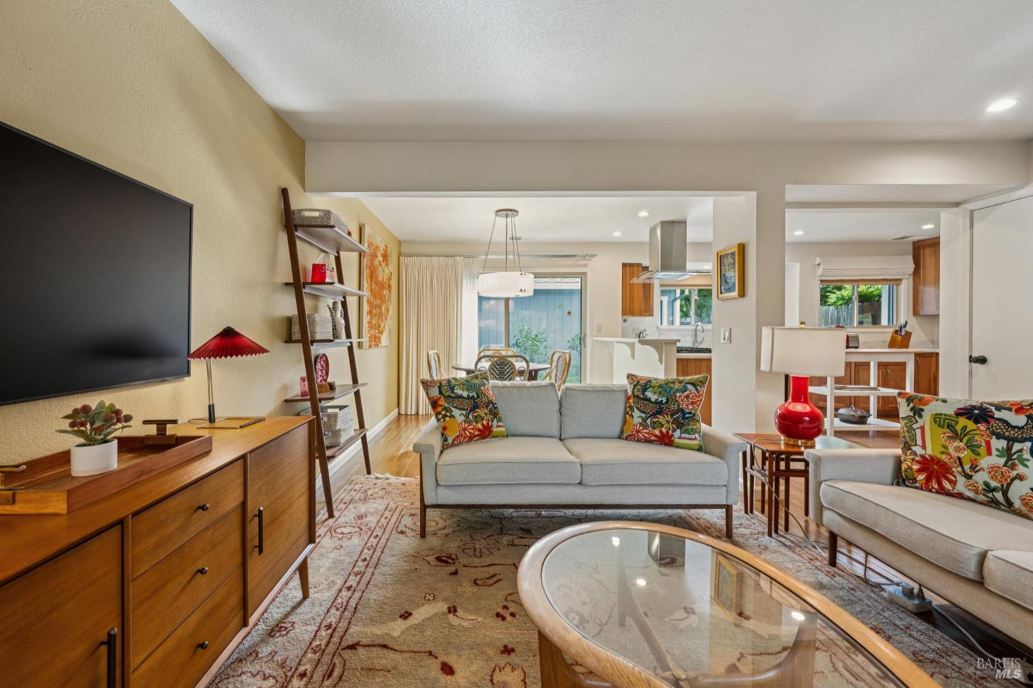 19167 Robinson Road, Unit Y Sonoma, CA 95476 - Photo 5 of 32 a living room with furniture and a flat screen tv
