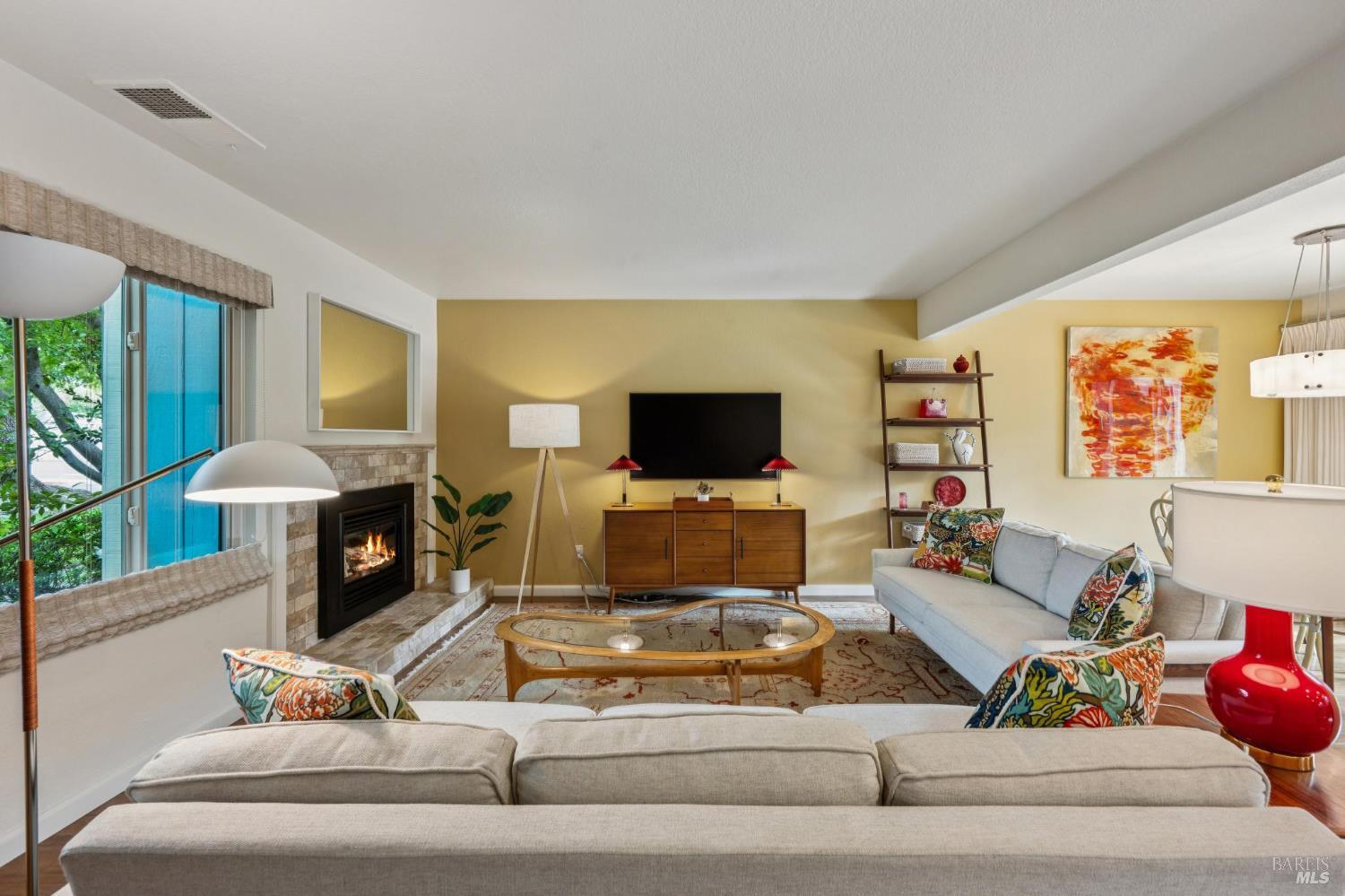 19167 Robinson Road, Unit Y Sonoma, CA 95476 - Photo 7 of 32 a living room with furniture and a flat screen tv