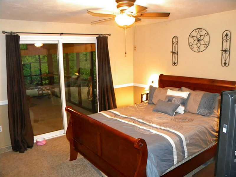 12460 Roth Drive North Huntingdon, PA 15642 - Photo 15 of 18 Master Bedroom. Master suite features full bath and sliding doors leading to covered/ screened in porch.