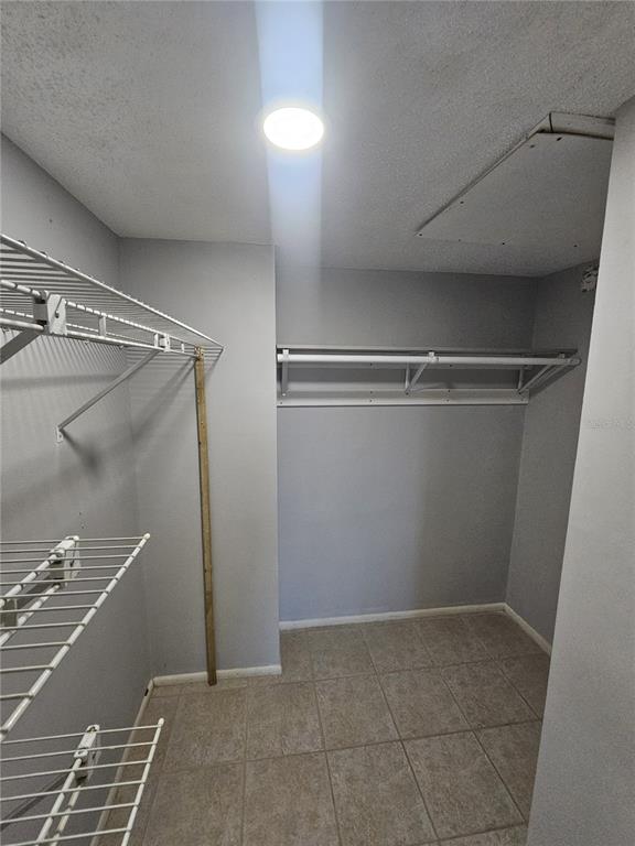 14800 Walsingham Road, Unit 1215 Largo, FL 33774 - Photo 12 of 26 a view of an empty walk in closet