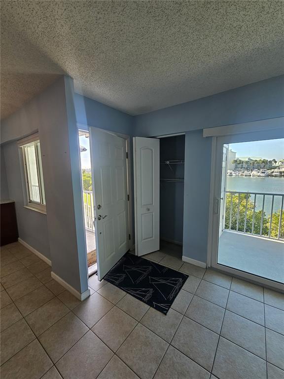 14800 Walsingham Road, Unit 1215 Largo, FL 33774 - Photo 6 of 26 a view of an empty room and window