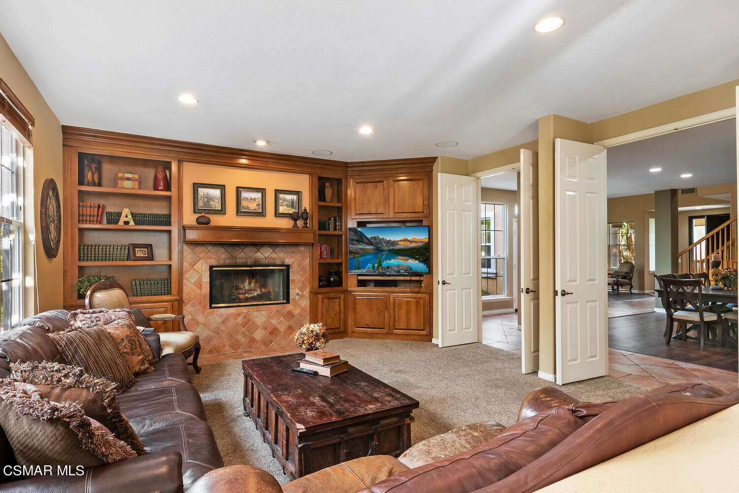 569 Rustic Hills Drive Simi Valley, CA 93065 - Photo 12 of 59 a living room with furniture and a fireplace