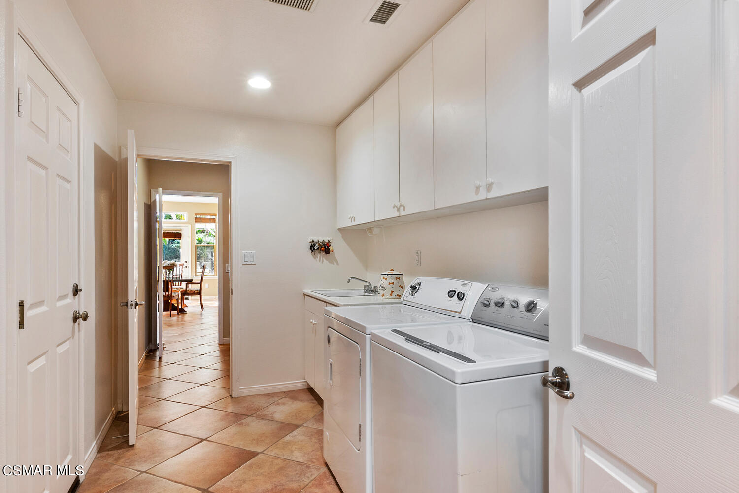 569 Rustic Hills Drive Simi Valley, CA 93065 - Photo 20 of 59 a utility room with washer and dryer