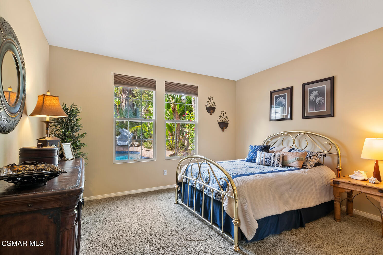 569 Rustic Hills Drive Simi Valley, CA 93065 - Photo 21 of 59 a bedroom with a bed and a table in it
