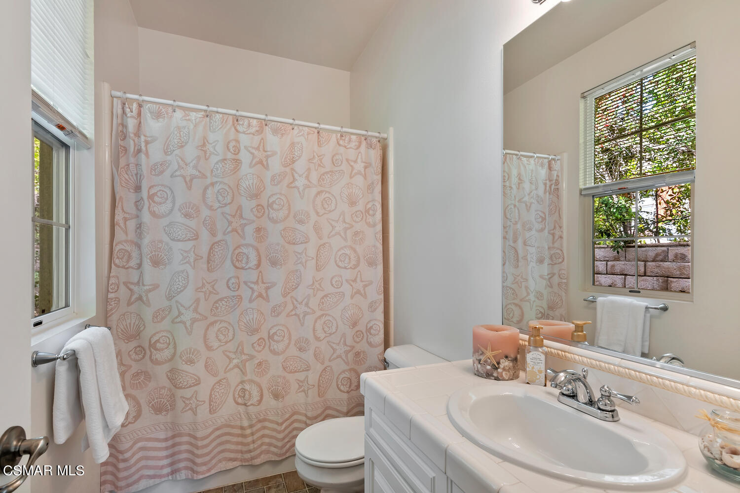 569 Rustic Hills Drive Simi Valley, CA 93065 - Photo 22 of 59 a bathroom with a sink toilet and shower