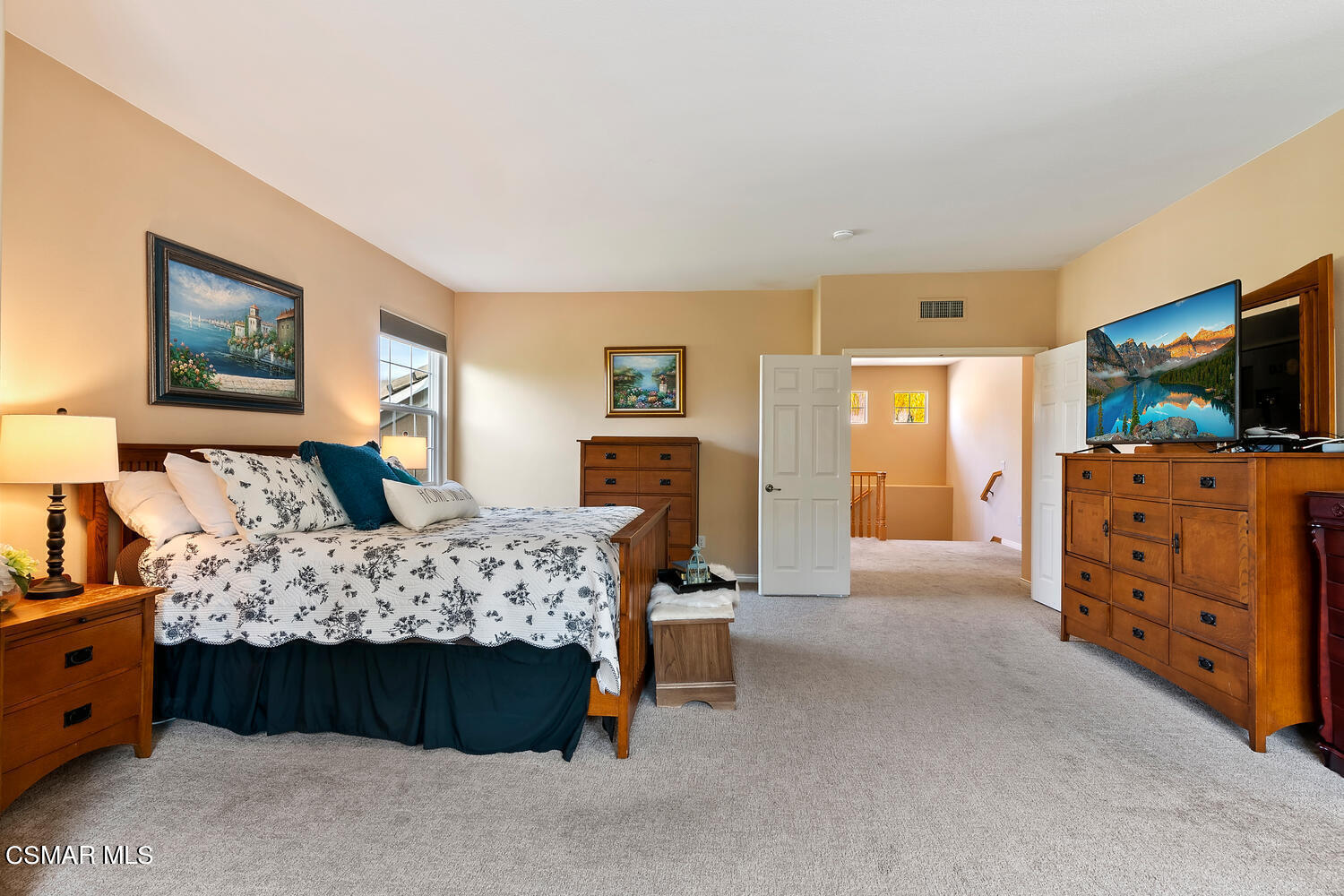 569 Rustic Hills Drive Simi Valley, CA 93065 - Photo 27 of 59 a bed room with furniture and a flat screen tv