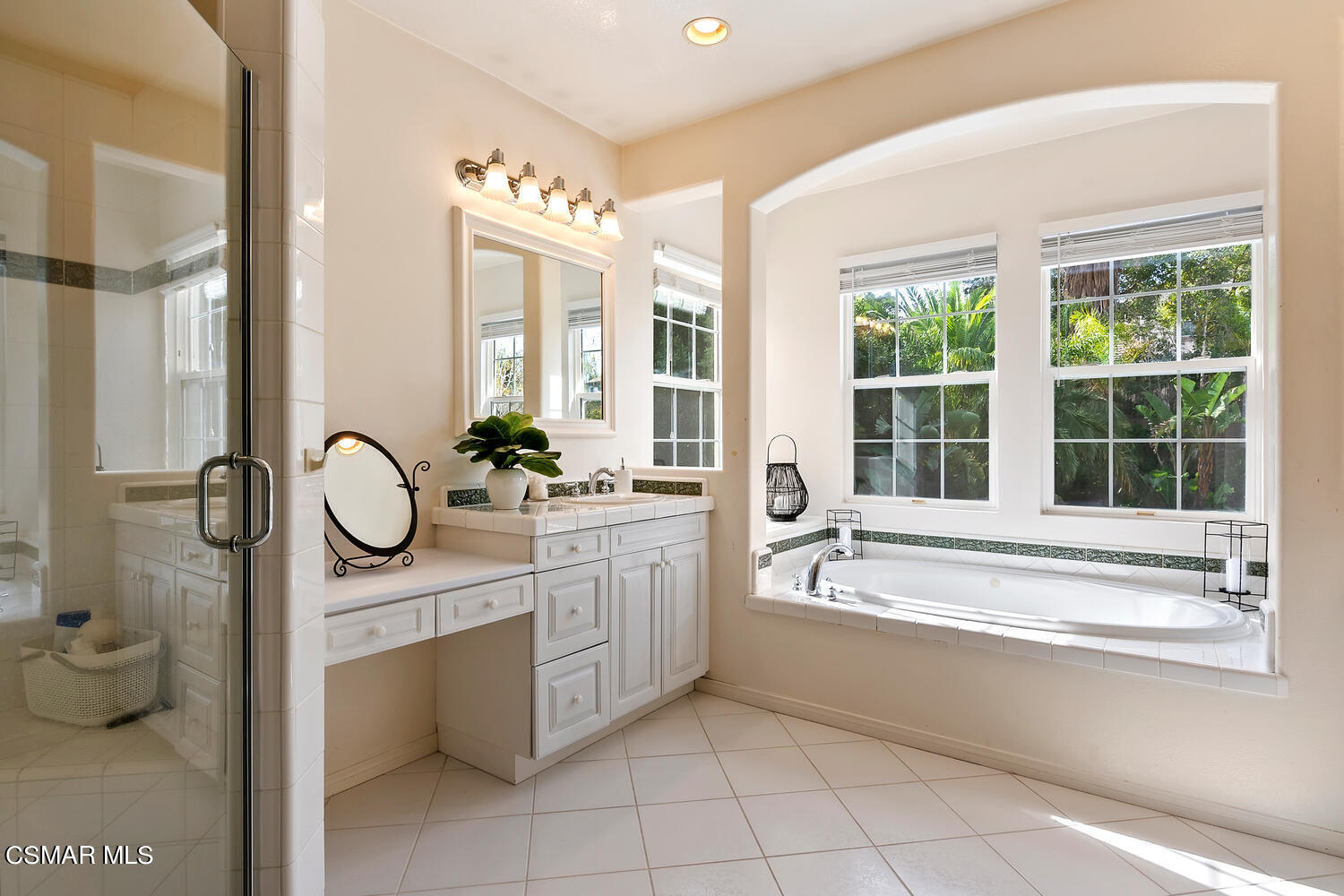 569 Rustic Hills Drive Simi Valley, CA 93065 - Photo 30 of 59 a spacious bathroom with a tub sink and mirror